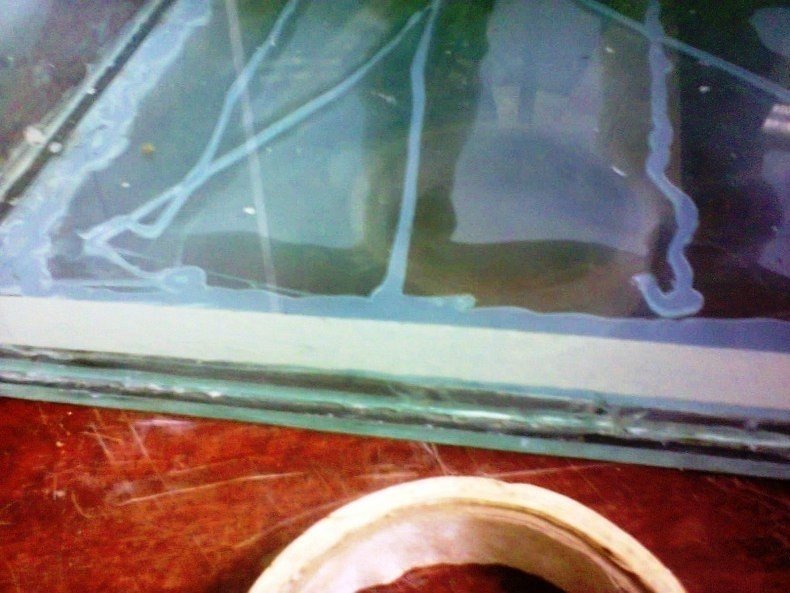 Оттереть стекло аквариума от силикона